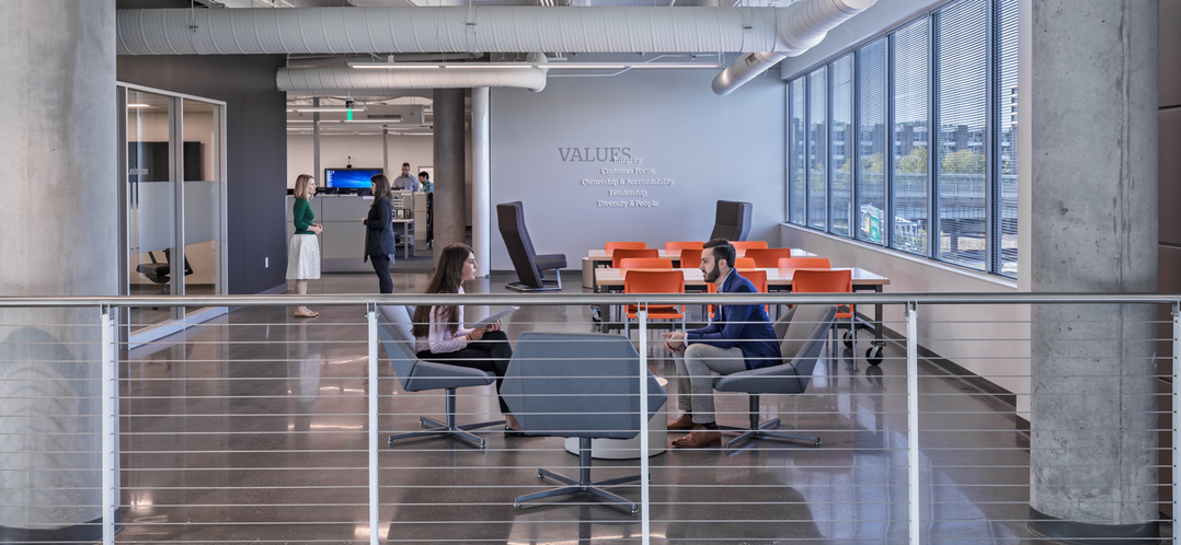 image of an open workspace in an office building
