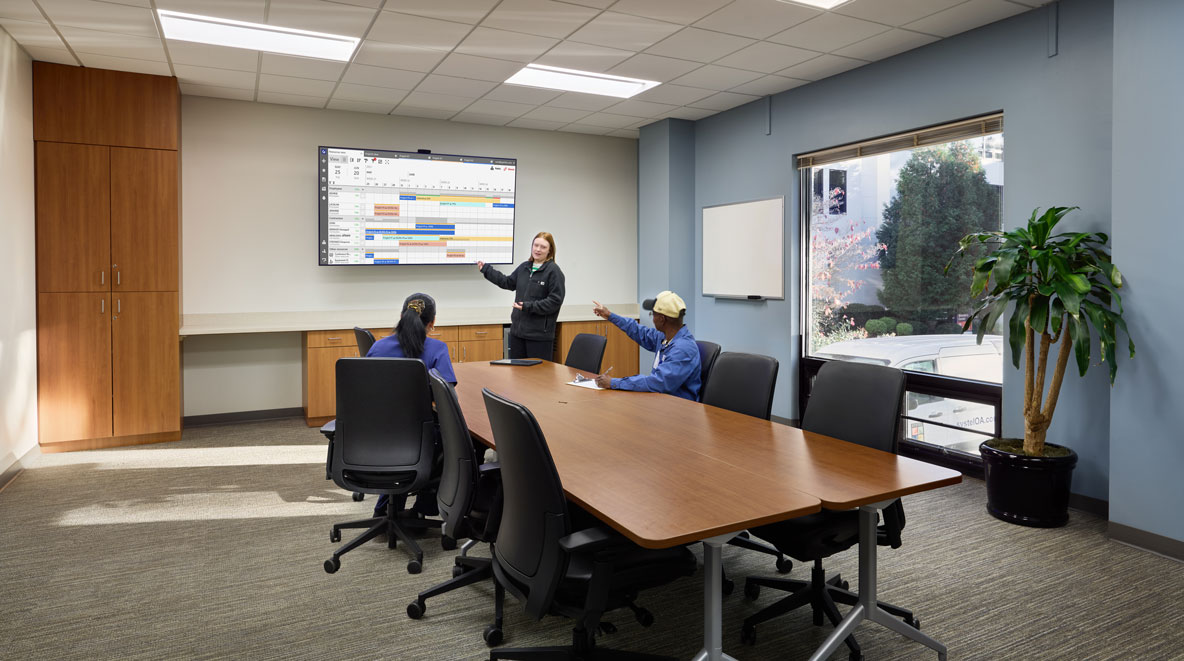 People working at the UNC Health Rex Hospital Environmental Services Department (EVS) Suite