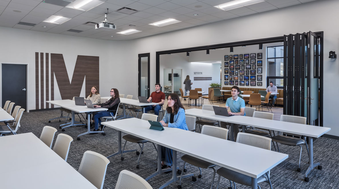 Employees working in Messer Constructions' training room in their new regional office.