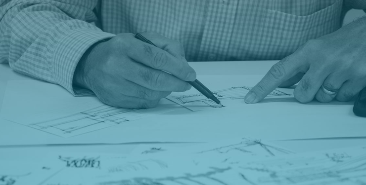 Person sketching a store plan