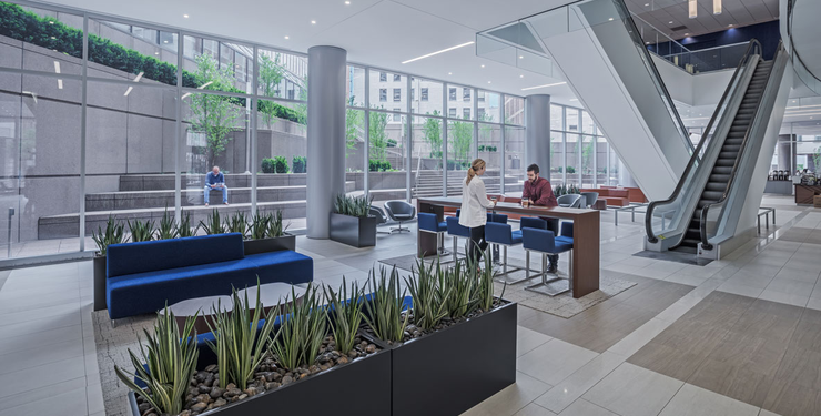 People meeting in the Columbia Plaza lobby
