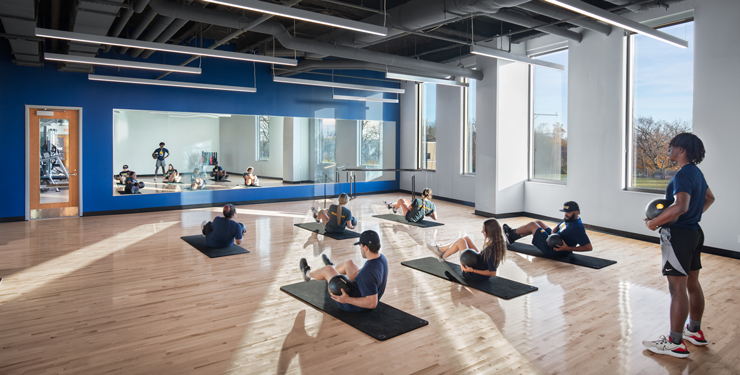 People working out in the Mount St. Joseph University multipurpose group fitness room