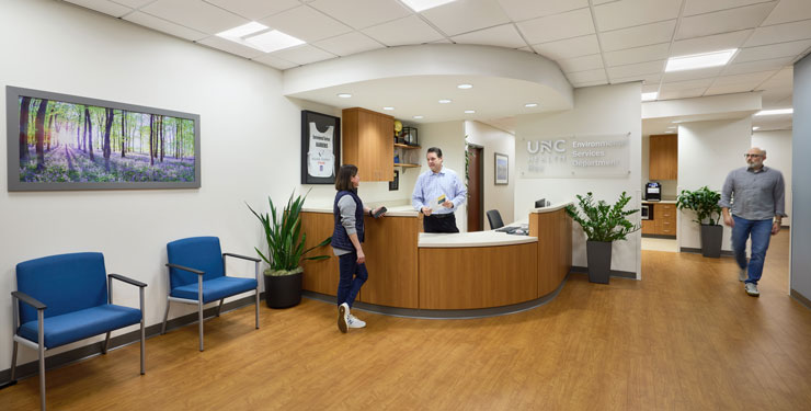 People working at the UNC Health Rex Hospital Environmental Services Department (EVS) Suite