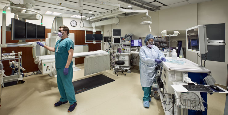 People working in the UNC Health Rex Vascular Interventional Radiology (VIR) Room (Artis Zee)