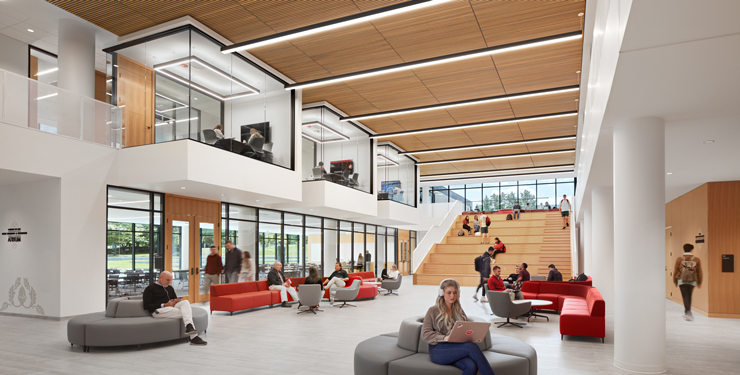 Students and faculty sitting in the University of Cincinnati College of Law atrium