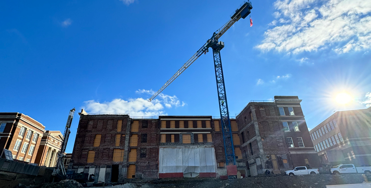 A construction crane at the site of UC Old Chem