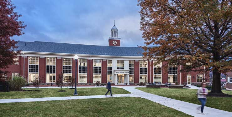 Leaves are changing colors in this shot of the Krapf Gateway Center