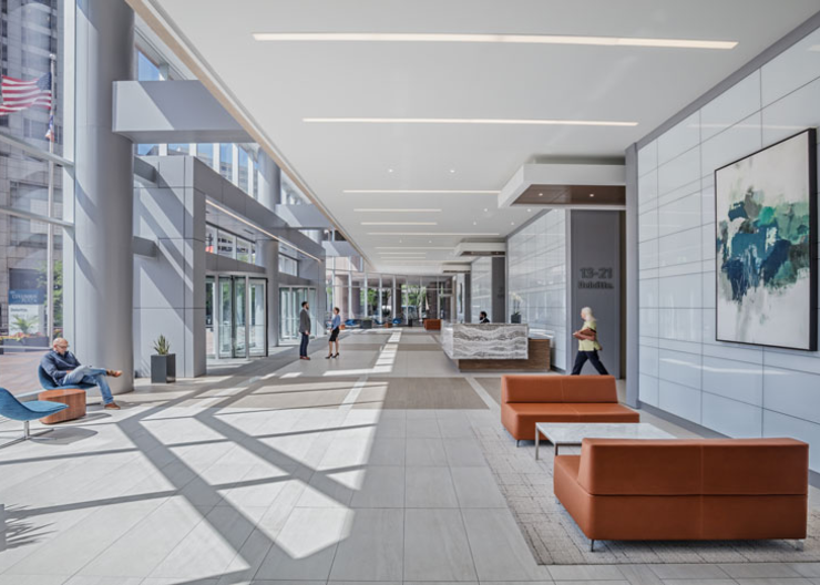People standing in lobby of Columbia Plaza