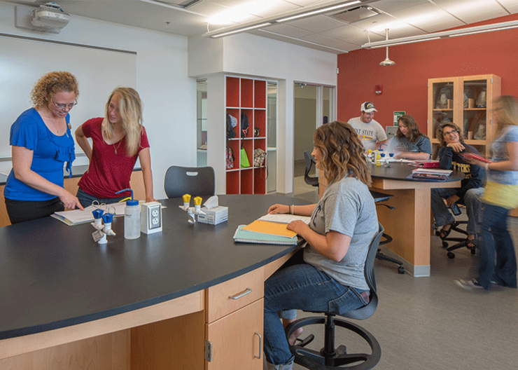 Students congregating in the lab at the Stark Science and Nursing building.