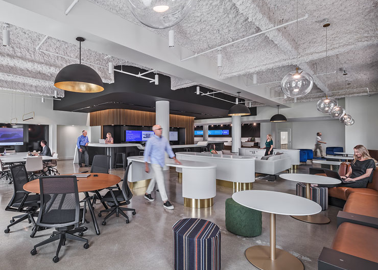Employees interact in the hub