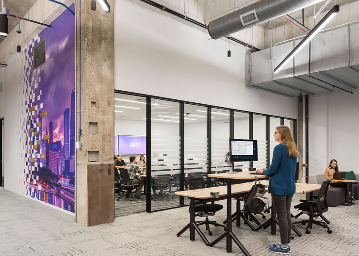 View of the large conference room and sit-to-stand desks