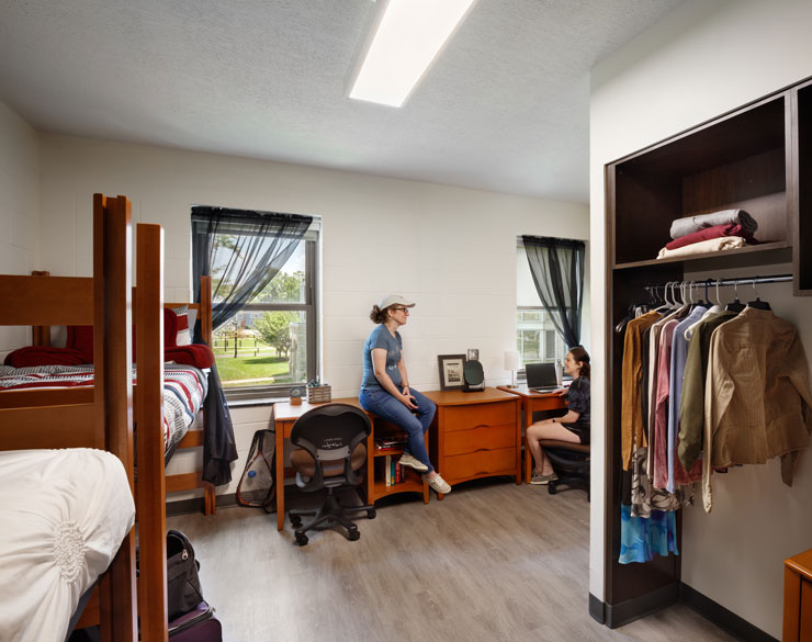 Students socializing in a student suite in Miller Hall at Heidelberg University