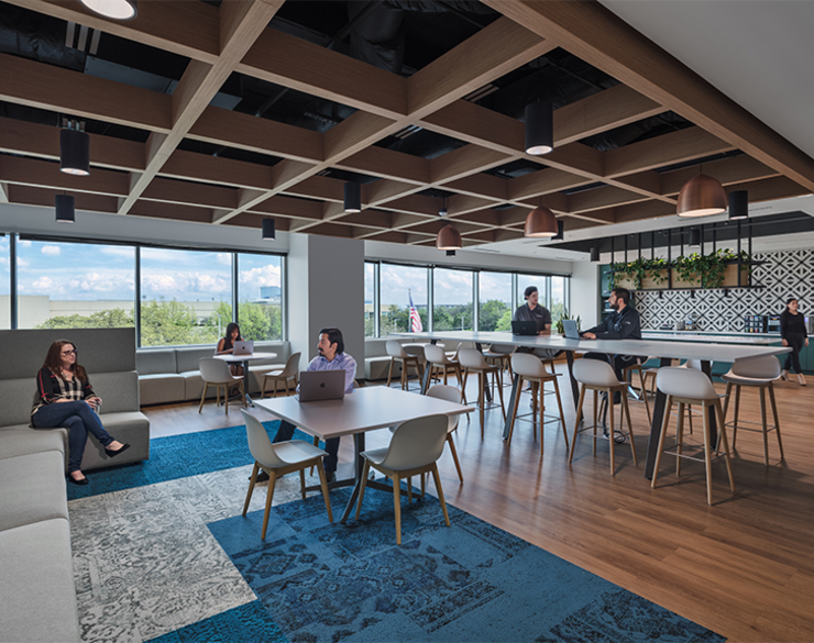 Forcepoint's common room includes plenty of seating for employees to sit on and converse with coworkers.