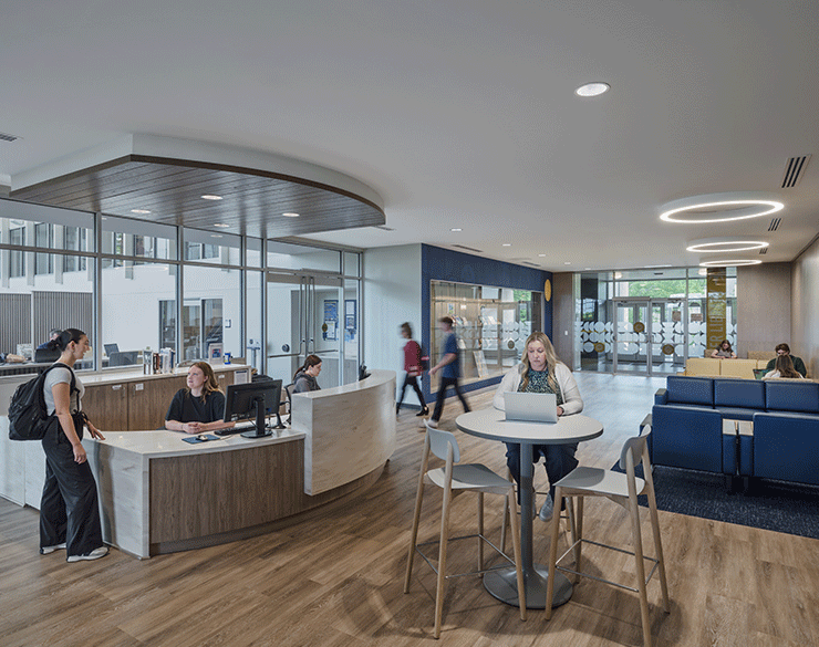 Users enjoying the lobby in the Alter Library at Mount St. Joseph University.