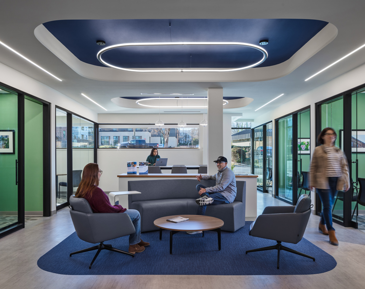 SECU's new open layout allows people to converse on comfy couches in the middle of the bank