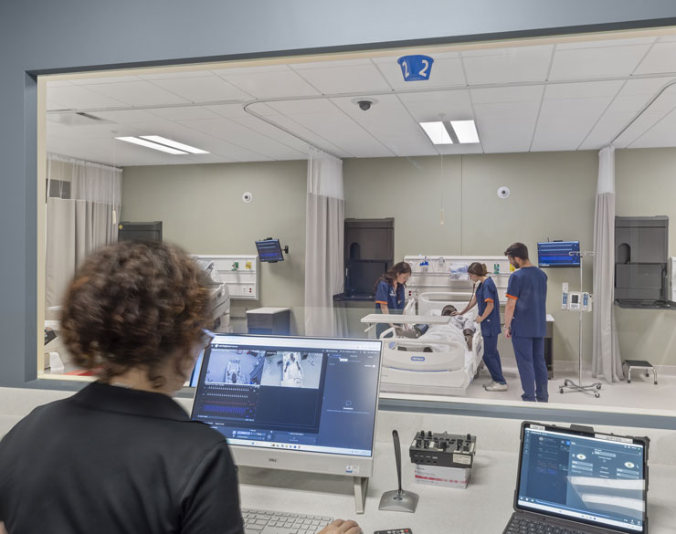Students in a simulation lab at Pepperdine University's College of Health Sciences