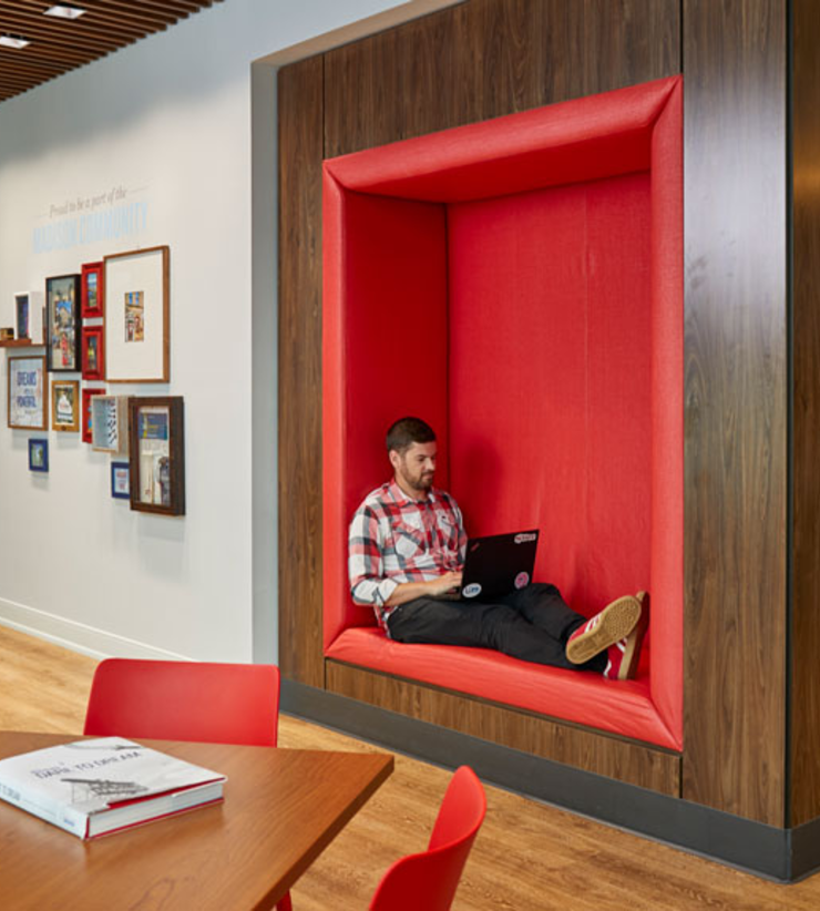 A person sitting in American Family Insurances DreamBank at Spark