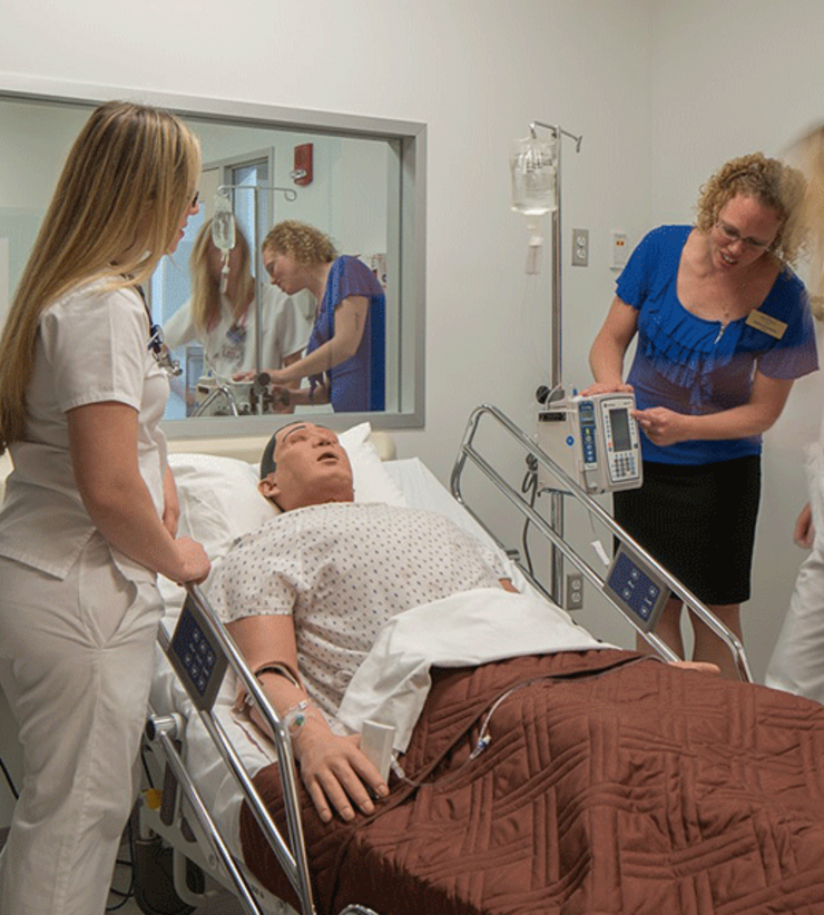 Students practicing hands-on skills in the Stark Science and Nursing building