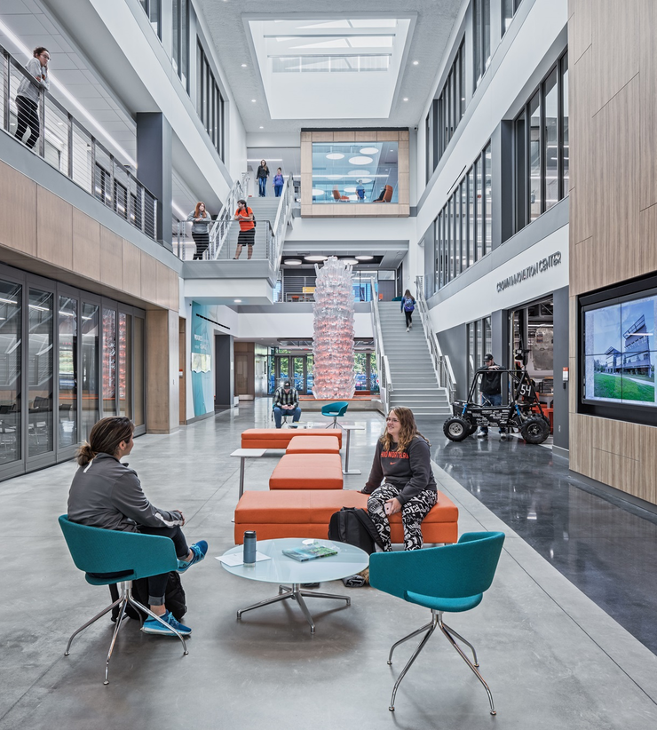 Students collaborate inside the atrium