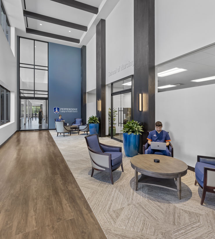 Students sitting in the lobby of Pepperdine University's College of Health Sciences