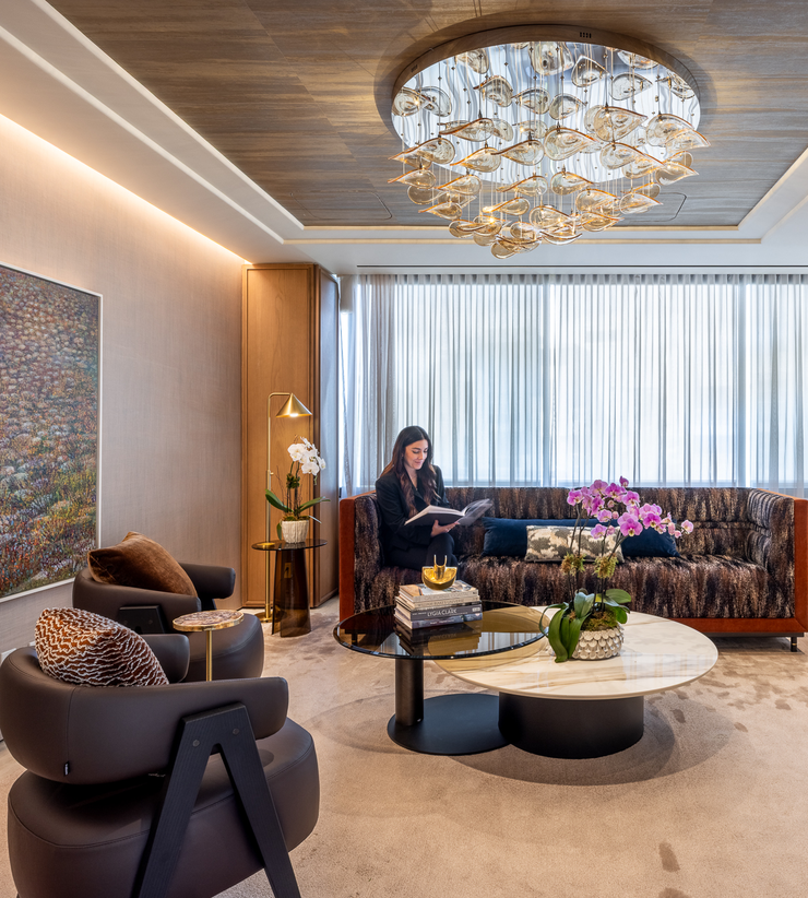 waiting area with couch and chairs