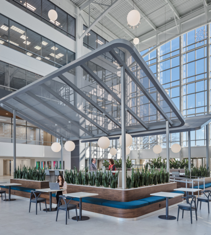 An aluminum canopy serves as a centerpiece for the lobby