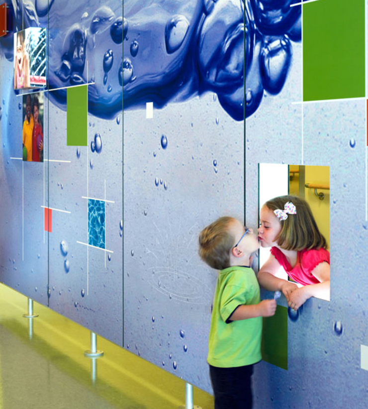 Children playing with interactive EGD elements