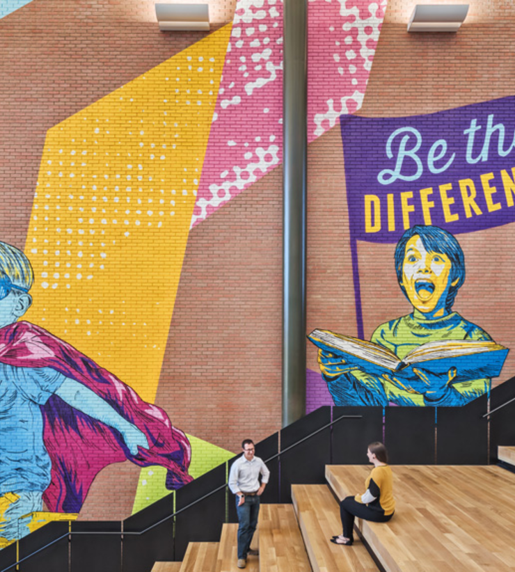 Murals are shown beside the staircase