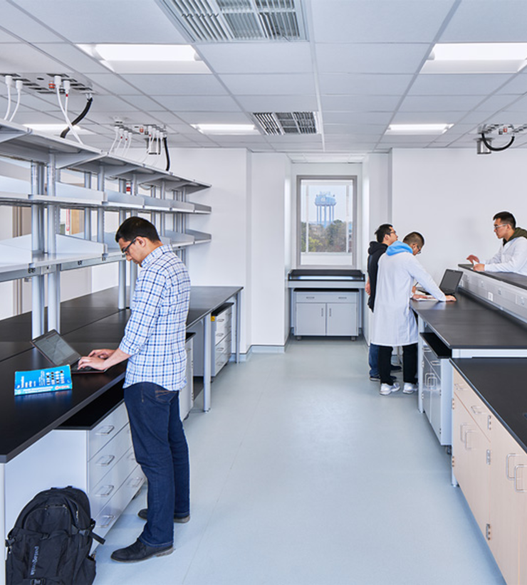 Students work on opposite sides of the lab