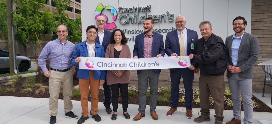 Some of the BHDP Design team standing in front of the new Winslow Research Pavilion at Cincinnati Children's.