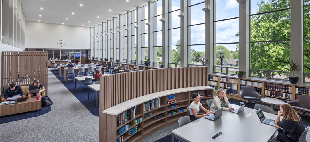 People studying in the Archbishop Alter Library at Mount St. Joseph University.