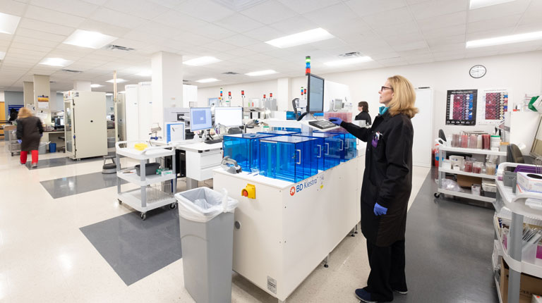 Women working in a clinical laboratory at UC Health