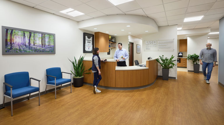 People working at the UNC Health Rex Hospital Environmental Services Department (EVS) Suite