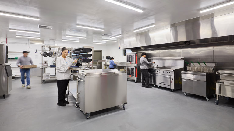 Employees working in the UNC Rex RNCC Kitchen