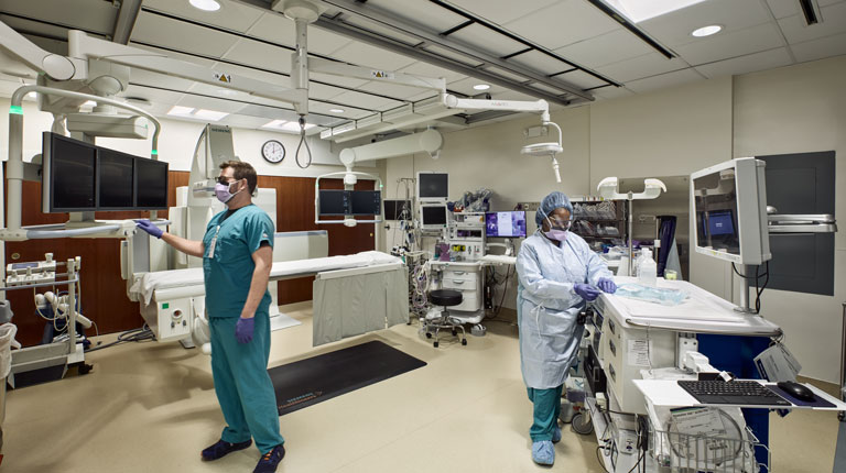 People working at the UNC Health Rex Vascular Interventional Radiology (VIR) Room (Artis Zee)