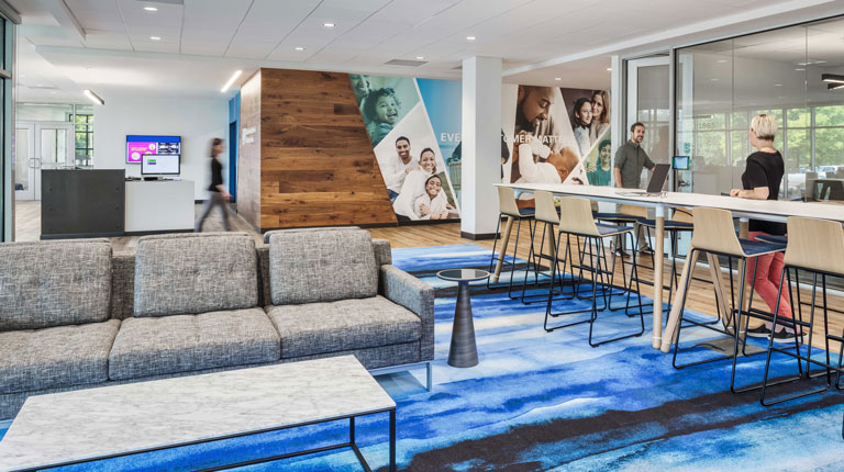 A modern reception and waiting area with blue accents 