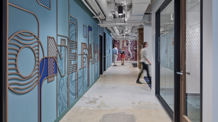 Hallway with "One Bank" graphic on the left-hand side